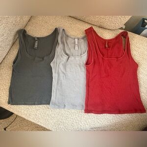 SKIMS Ribbed Tank Top in Red, light grey and dark grey